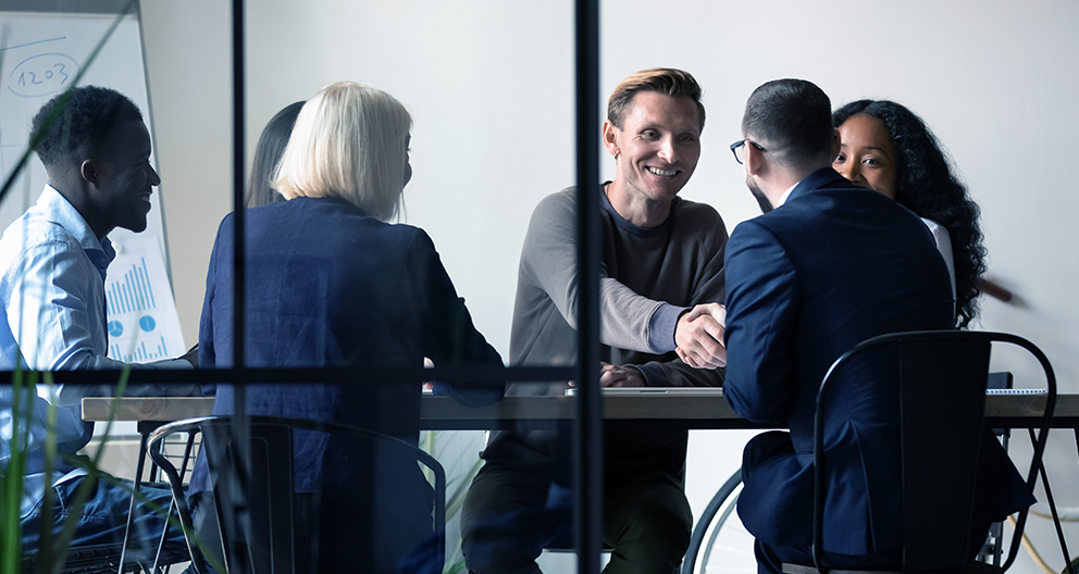 Priority Logistics team hiring transportation professionals in boardroom